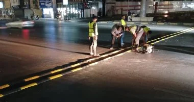 تركيب مطبات صناعية بشارع جامعة الدول فى حى العجوزة لتعزيز السلامة.. صور